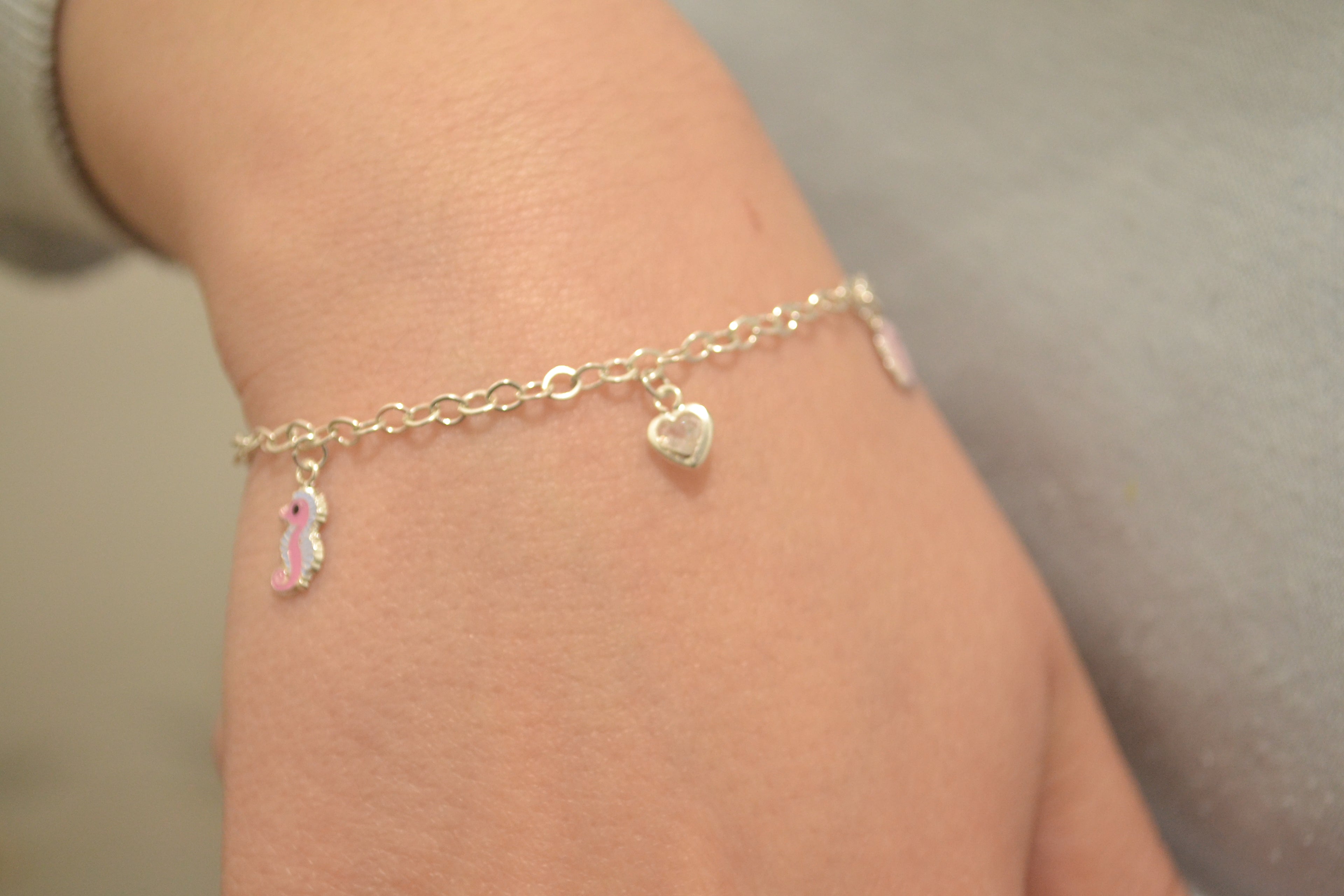 PULSERA JUEGO CABALLITO MAR ROSA