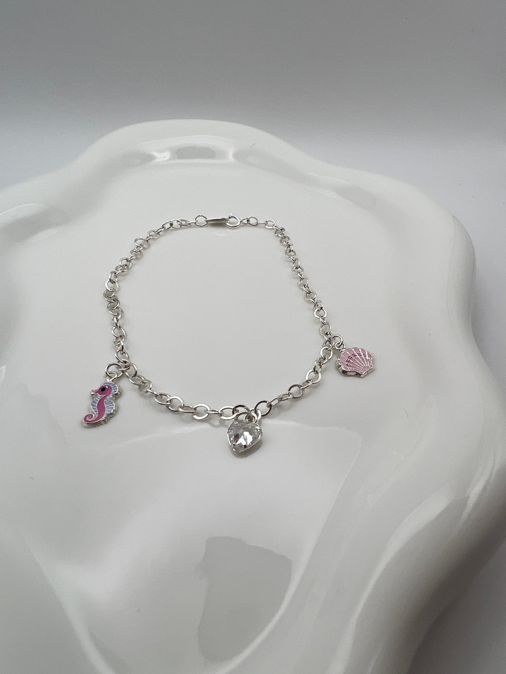 PULSERA JUEGO CABALLITO MAR ROSA