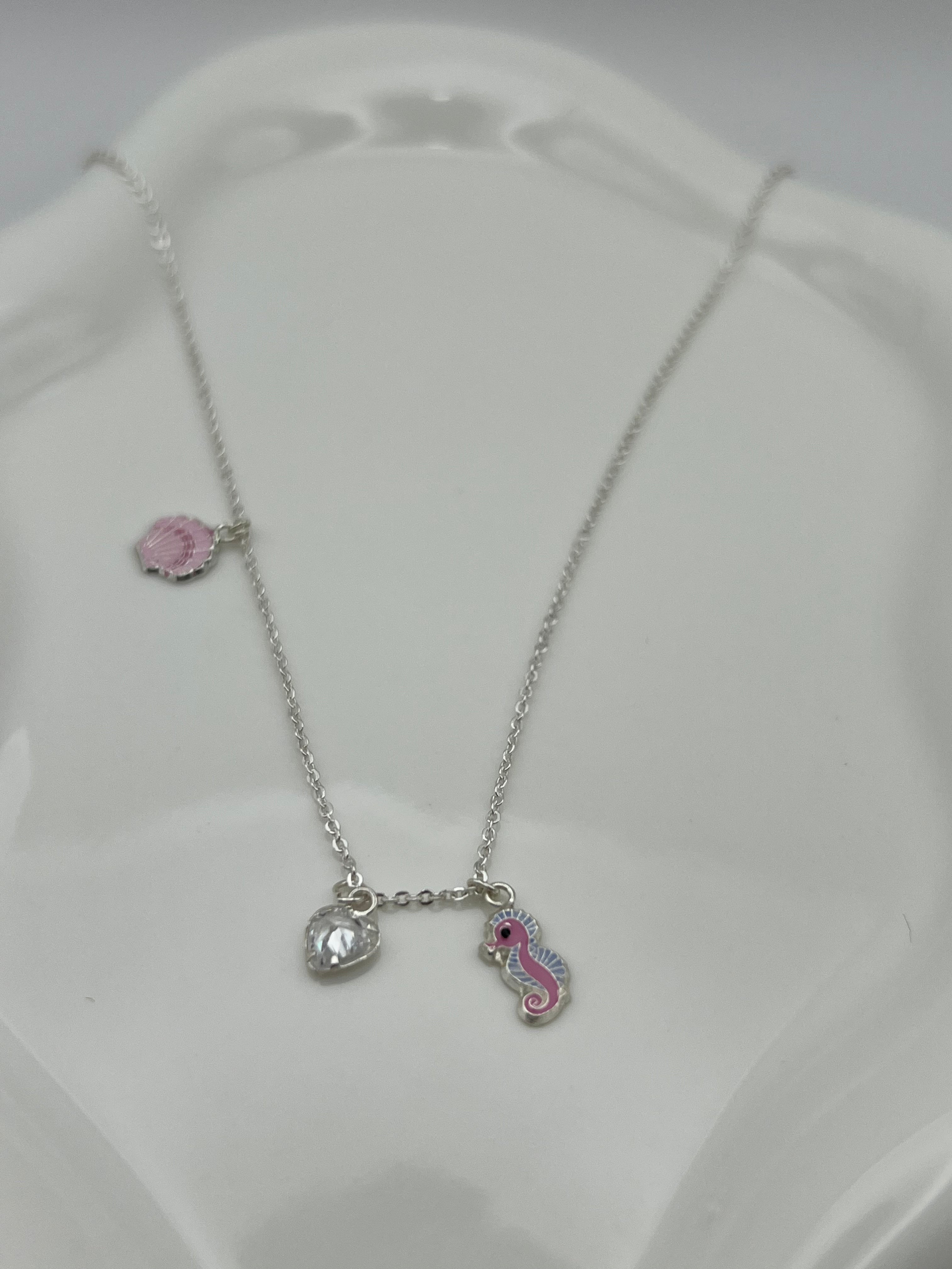 COLLAR JUEGO CABALLITO MAR ROSA